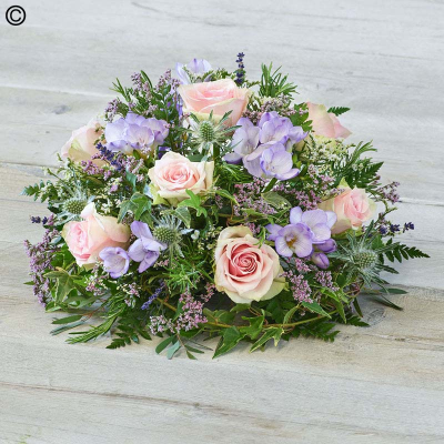 Rose and Freesia Posy - A pretty and popular design, this posy features roses and fragrant freesias in stunning pastel tones.

Approximate Product Dimensions:
Standard:
Width: 35cm, Height: 20cm.

Large:
Width: 40cm, Height: 24cm.

Extra large:
Width: 45cm, Height: 28cm.