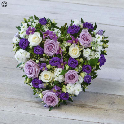 Lovely Lilac Heart - A heart tribute in beautiful purple and white shades, featuring fragrant stocks and lilac roses. 

Approximate Product Dimensions:

Length: 38cm, Width: 38cm, Height: 15cm.