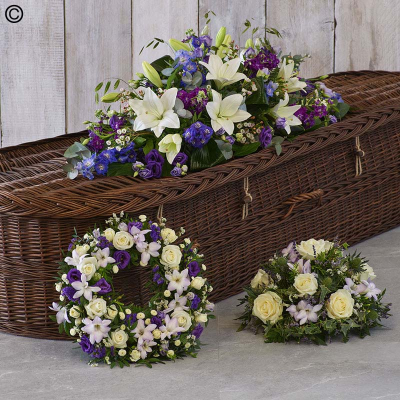 The Blue Collection - A collection of some of our most popular tributes - a casket spray, wreath and posy. Each features beautiful blooms in blue tones including roses, delphiniums, freesias and more.

Approximate Product Dimensions:
Casket Spray:
Length 90cm.Width 40cm. Height 30cm.

Wreath:
Width 42cm. Height 12cm.

Posy:
Width 35cm. Height 20cm.