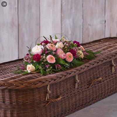 Pastel Linear Spray - A beautiful spray of pastel blooms, including germini, roses, and carnations, arranged in a linear design.

Approximate Product Dimensions:
Standard:
Length: 70cm, Width: 20cm, Height: 20cm.

Large:
Length: 80cm, Width: 20cm, Height: 20cm.

Extra large:
Length: 100cm, Width: 20cm, Height: 20cm.