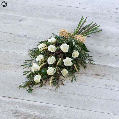 Classic Rose Sheaf - A dozen roses contrast beautifully with silvery eucalyptus foliage and natural elements including dried wheat, natural birch and a raffia bow.

Approximate Product Dimensions:

Length: 80cm, Width: 35cm, Height: 15cm.