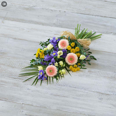 Lemon and Blue Sheaf - A delicate array of yellow, blues and peach featuring irises, chrysanthemums and germini. 

Approximate Product Dimensions:
Standard:
Length: 60cm, Width: 30cm, Height: 15cm.

Large:
Length: 70cm, Width: 30cm, Height: 15cm.

Extra large:
Length: 80cm, Width: 40cm, Height: 15cm.