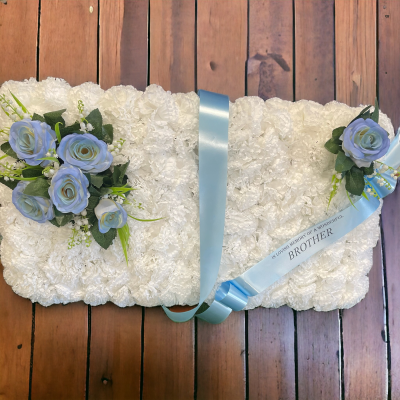 Funeral Silk Open Book - Our open book tributes offer a personalized and meaningful way to honor a loved one. Customize your book with  messages, and keepsakes to create a lasting memorial.