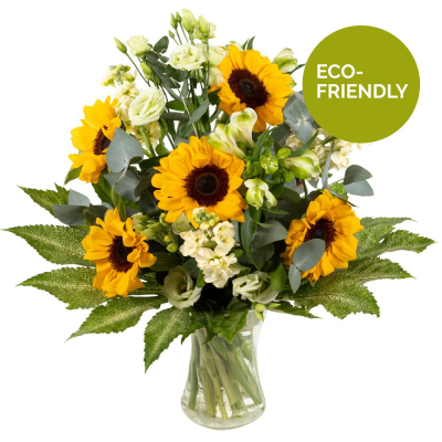 Sunny Spells  - Sunshine, showers and beautiful flowers … The magnificent sunflower with an attendance of beautiful blossoms to complement, upheld with bright foliage.  